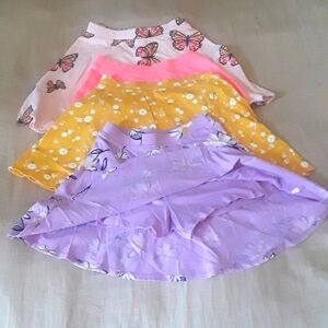 4 SKORTS CARTWHEEL SCOOTER SIZE 8 FOR GIRLS